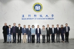 Deputy Director Huang Liuquan of the Liaison Office of the Central People's Government in the Macao Special Administrative Region, along with his delegation, visited the Faculty of Law at M.U.S.T.